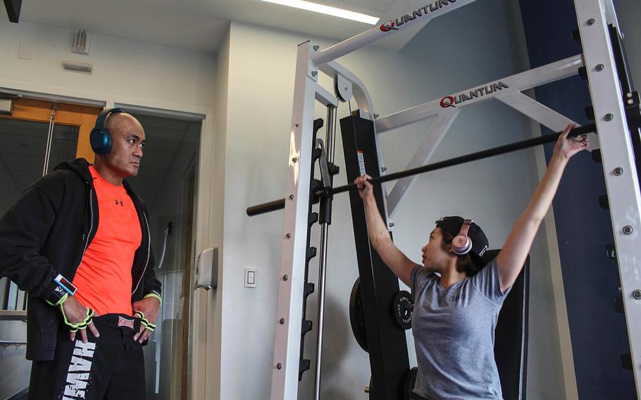 Kianni Martinez and her father, Air Force Lt. Col. Kato Martinez, conduct physical therapy at the Center for the Intrepid at Fort Sam Houston in San Antonio on Feb. 6, 2017. Martinez trains to recover her strength following her injuries in the Brussels airport bombing last March, while preparing for the rigors of Air Force ROTC.