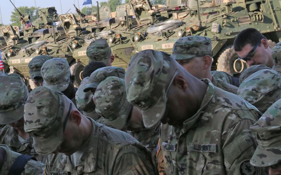 Soldiers from 2nd Squadron, 2nd Cavalry Regiment, bow their heads in prayer in preparation for Operation Atlantic Resolve's Cavalry March, May 13, 2015. The Chaplain Alliance for Religious Liberty, which advocates for freedom of religious expression in uniform, sent a letter to acting Army Secretary Robert Speer criticizing an Army directive titled “Promoting Diversity and Inclusion.”