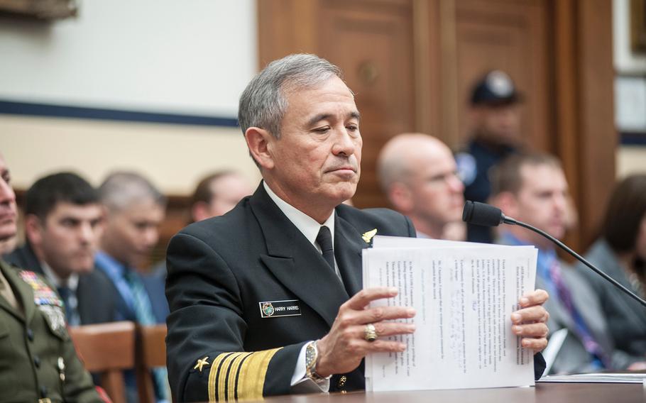 Adm. Harry Harris arranges his notes after giving his opening statements during a House Committee on Armed Services hearing on Capitol Hill in Washington, D.C., on Wednesday, April 26, 2017. Harris, the commander of the U.S. Pacific Command, was addressing the importance of America's engagement in the Indo-Asia-Pacific region.