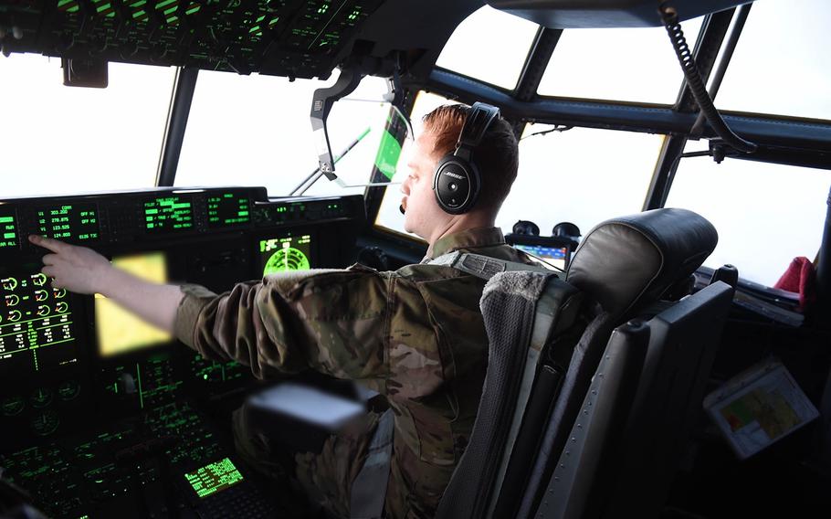First Lt. Paul Harrington, of Cumberland, R.I., serves as co-pilot on a C-130J flight from Bagram Air Field to Mazar-e-Sharif, May 4, 2017. Harrington, who commissioned in 2013, is on his first deployment to Afghanistan.