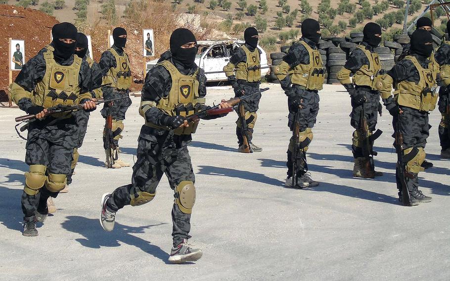In a March, 2016 file photo, elite fighters with the Kurdish YPG training in Iraqi Kurdistan.