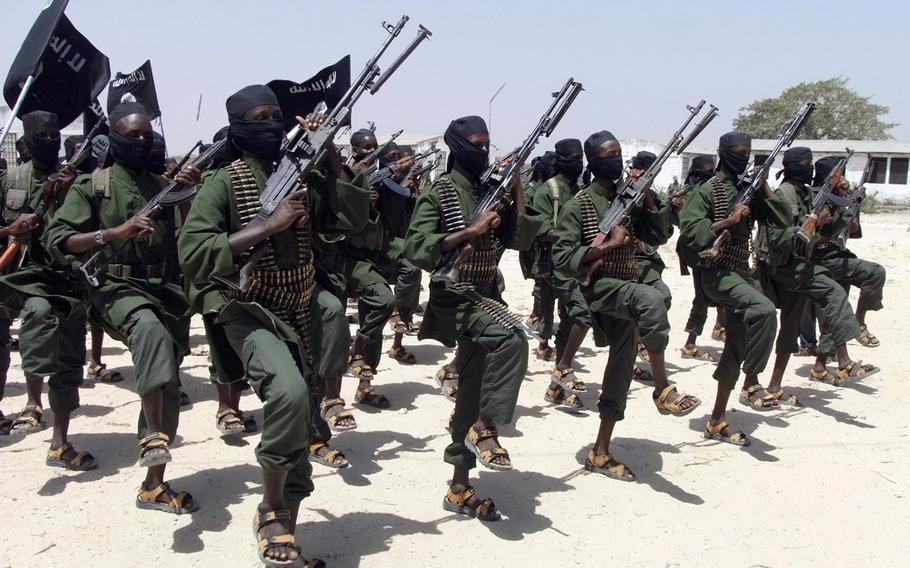 In a February, 2011 file photo, newly trained al-Shabab fighters perform military exercises in the Lafofe area, south of Mogadishu, Somalia. The U.S. conducted “a kinetic strike operation” early Sunday, July 2, 2017, against an al-Shabab target.