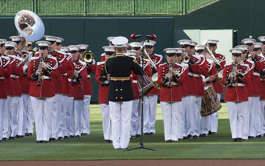 The President's Own U.S. Marine Corps Band plays the national anthem before a game between the Washington Nationals and Milwaukee Brewers at Nationals Park in Washington, D.C., July 25, 2017.