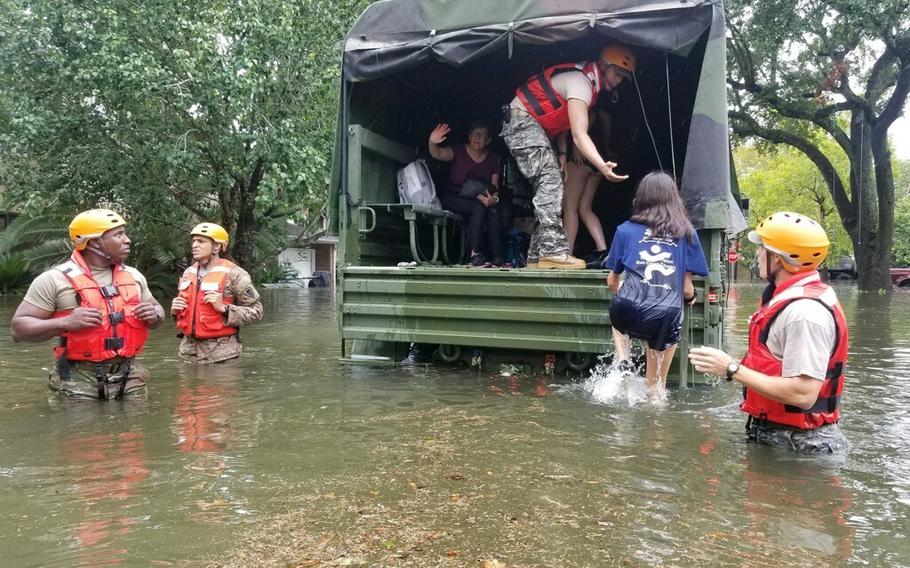 Texas National Guard soldiers arrive in Houston, Texas to aid citizens in heavily flooded areas from the storms of Hurricane Harvey Aug 27, 2017.