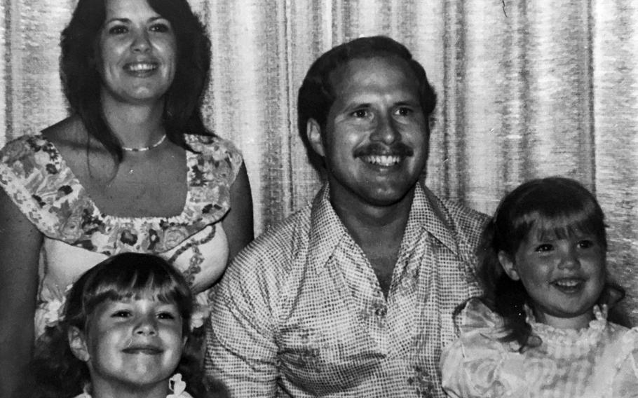 Mike Sanzaro poses with wife, Debby, and daughters Melissa and Vanessa in an old family photo. 