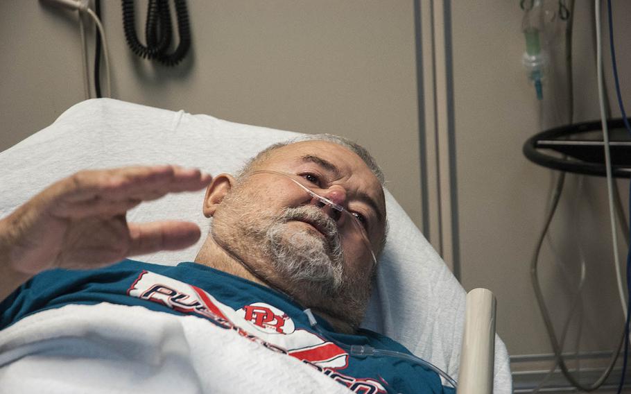 Air Force veteran Nelson Noriega, 70, rests in an emergency room bed at the Veterans Affairs Medical Center in San Juan, Puerto Rico, on Wednesday, Nov. 8, 2017. 