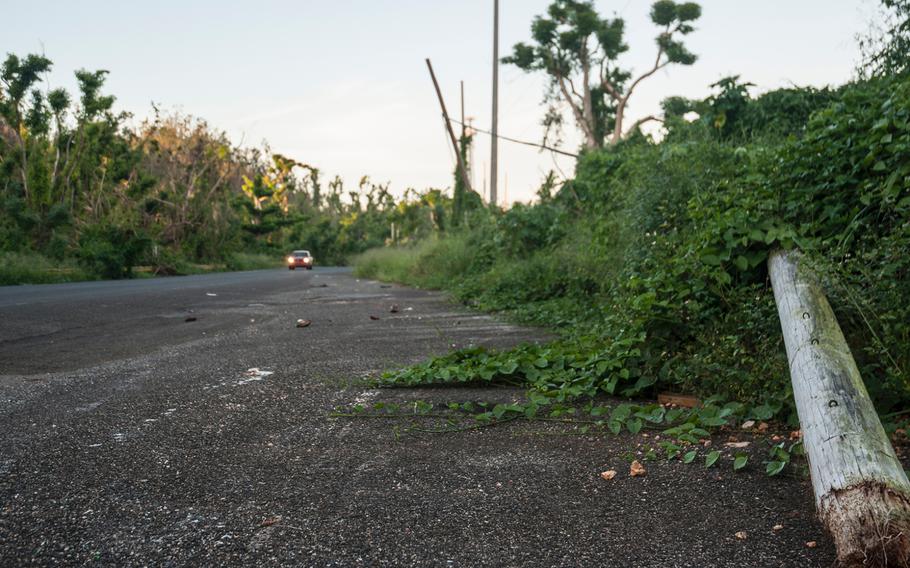 A utility pole remains grounded along a rural road in Puerto Rico on Nov. 13, 2017, nearly eight weeks after Hurricane Maria slammed into the island, devastating its infrastructure.
