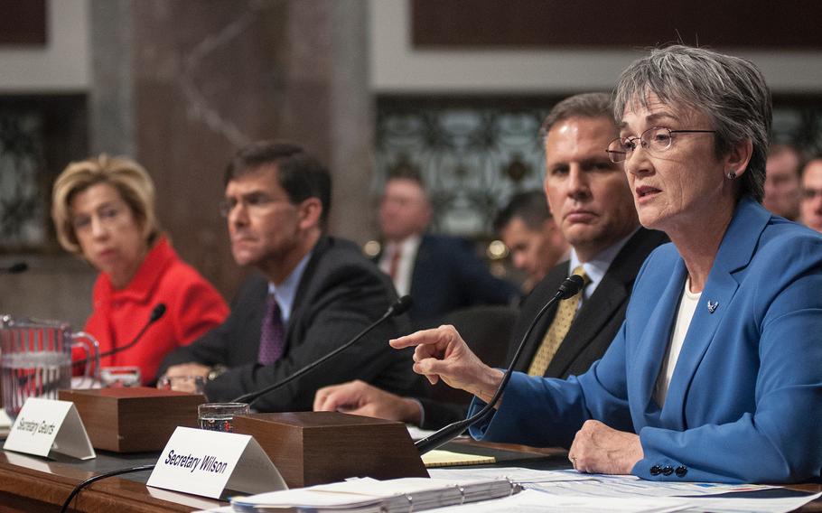 Secretary of the Air Force Heather Wilson answers a question about military acquisitions during a Senate Armed Services Committee hearing on Capitol Hill in Washington, D.C., on Thursday, Dec. 7, 2017. Also attending the hearing were, from left: Under Secretary of Defense for Acquisition, Technology, and Logistics Ellen Lord; Secretary of the Army Mark Esper; and Assistant Secretary of the Navy for Research, Development, and Acquisition James Geurts