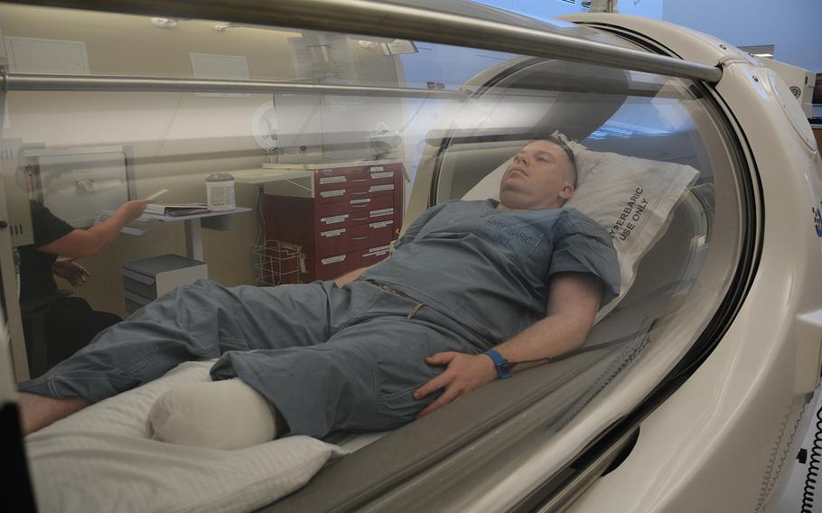 Army Capt. Kyle Salik is the first patient to receive oxygen therapy at the new Undersea & Hyperbaric Medicine Clinic at Brooke Army Medical Center June 20, 2017.