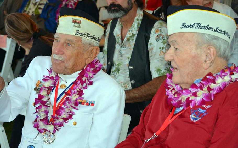 Pearl Harbor survivors Delton Walling, left, and John Mathrusse attend the 76th anniversary commemoration of the attack on Thursday, Dec. 7, 2017.
