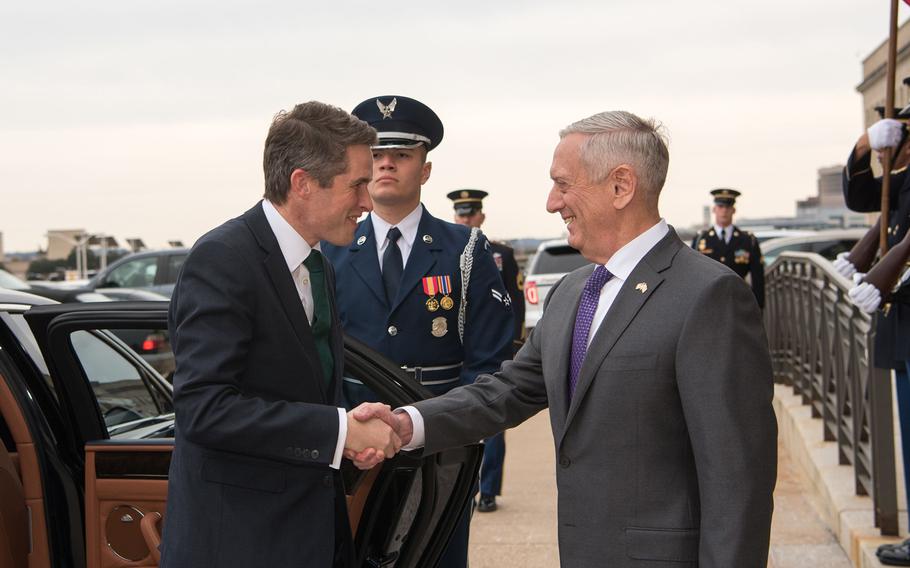 Defense Secretary James N. Mattis greets British Defense Secretary Gavin Williamson at the Pentagon on Thursday, Feb. 1, 2018. Mattis issued a stern warning Friday to the embattled Syrian regime that the United States is investigating claims of its recent use of banned chemical weapons.