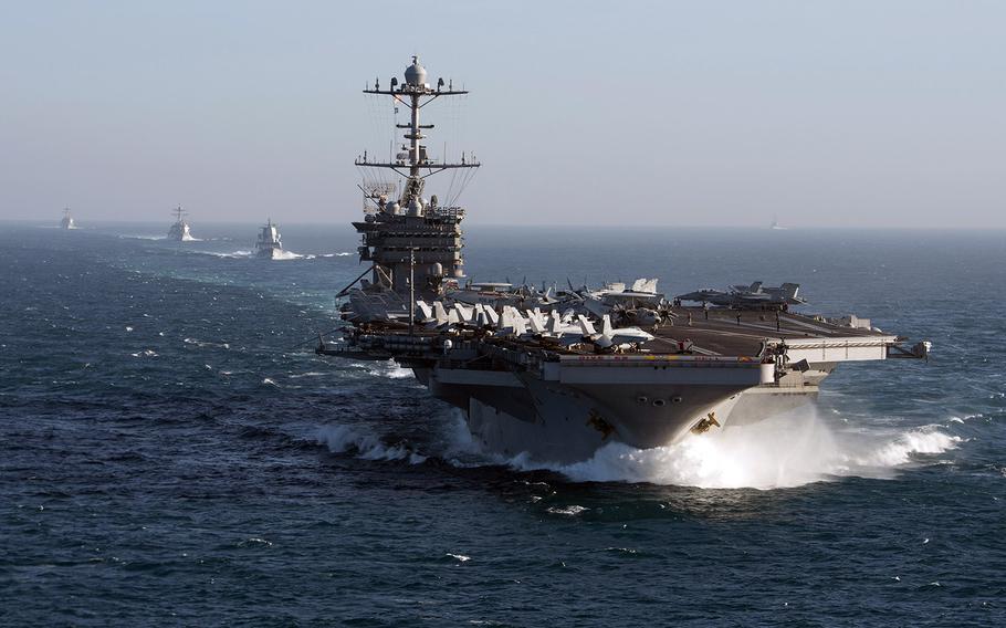 The aircraft carrier USS Harry S. Truman and ships assigned to the Harry S. Truman Carrier Strike Group transit the Atlantic Ocean while conducting composite training unit exercise in February, 2018.