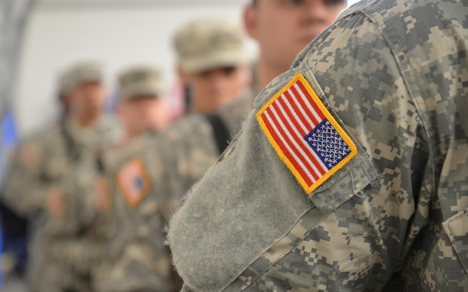 Soldiers stand in formation during a deployment ceremony for an Army Reserve battalion in 2016. The Army, after doling out housing allowances to a group of reservists deployed to Germany, said they were not entitled to the allowances.
