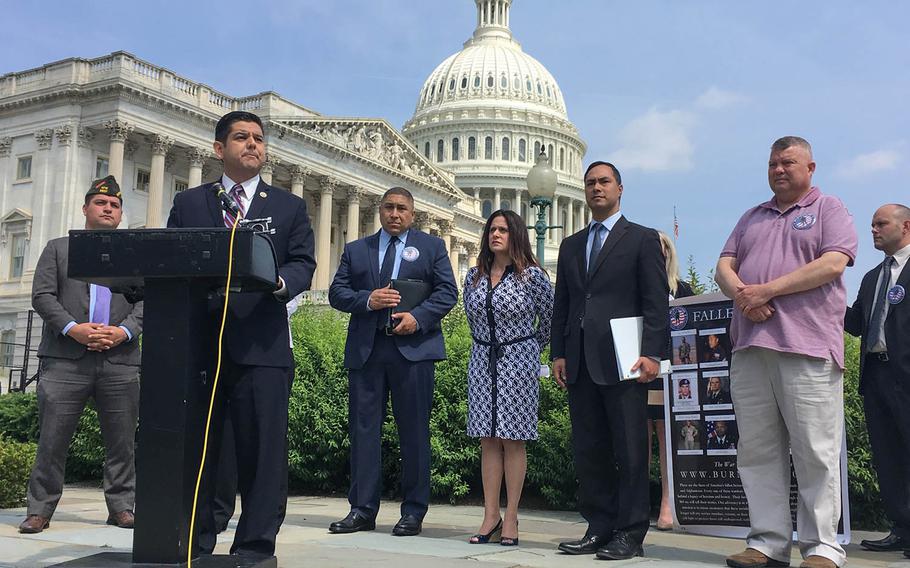 Rep. Raul Ruiz, D-Calif., speaks in front of the U.S. Capitol at a news conference about the need for Congress to support legislation creating better medical benefits for veterans suffering from illnesses contracted due to exposure to burn pits. 