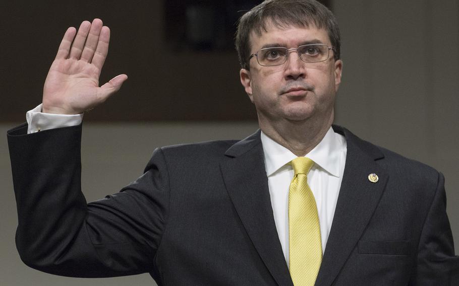 Secretary of Veterans Affairs nominee Robert Wilkie is sworn in at the start of a Senate Veterans' Affairs Committee hearing on Capitol Hill, June 27, 2018.