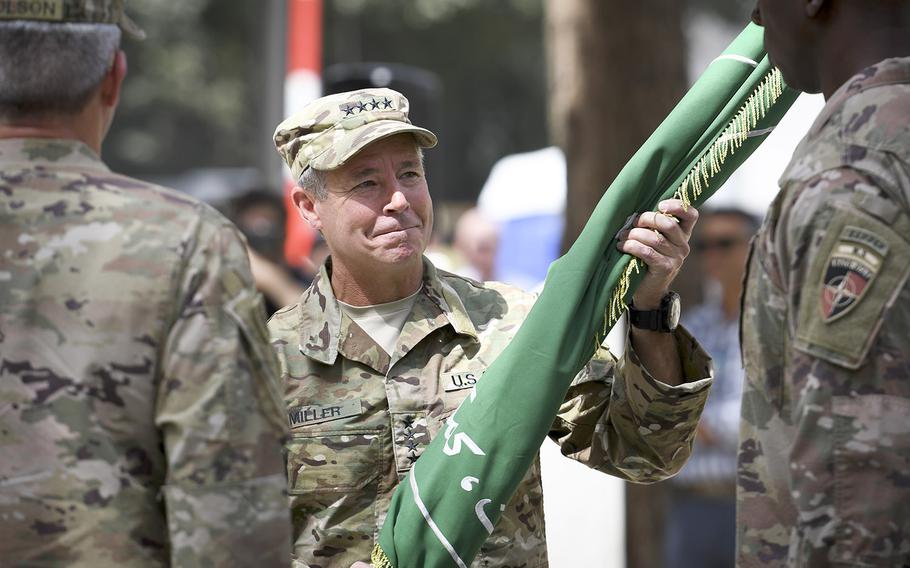 Gen. Austin Scott Miller assumes command of NATO forces in Afghanistan in a ceremony Sunday at Resolute Support Headquarters in Kabul. 
