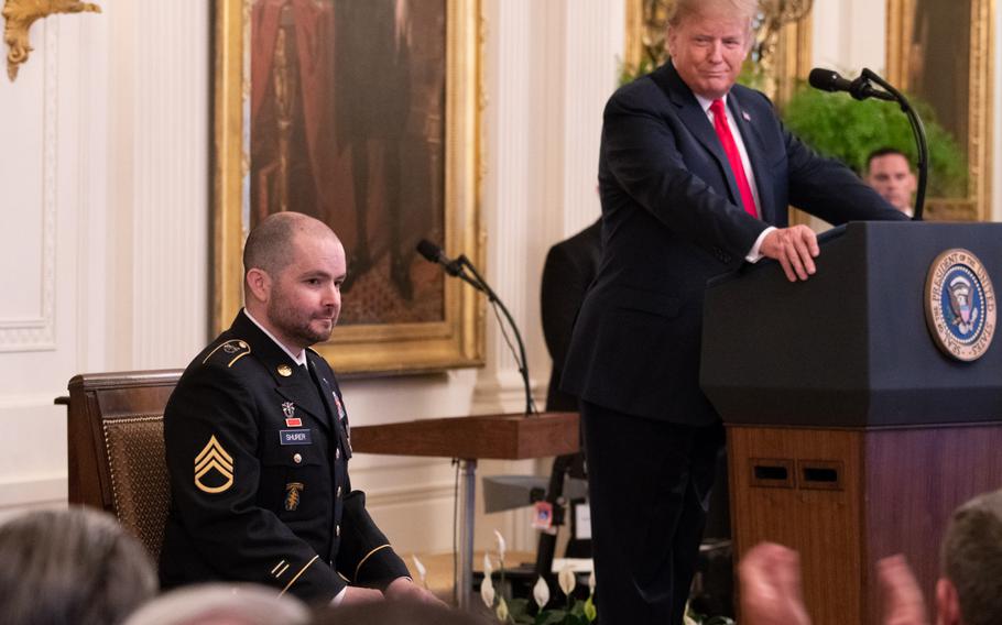 President Donald Trump addresses the crowd gathered at the White House to witness the presentation of the Medal of Honor to former Army medic Ronald J. Shurer II on Monday, Oct. 1, 2018.
