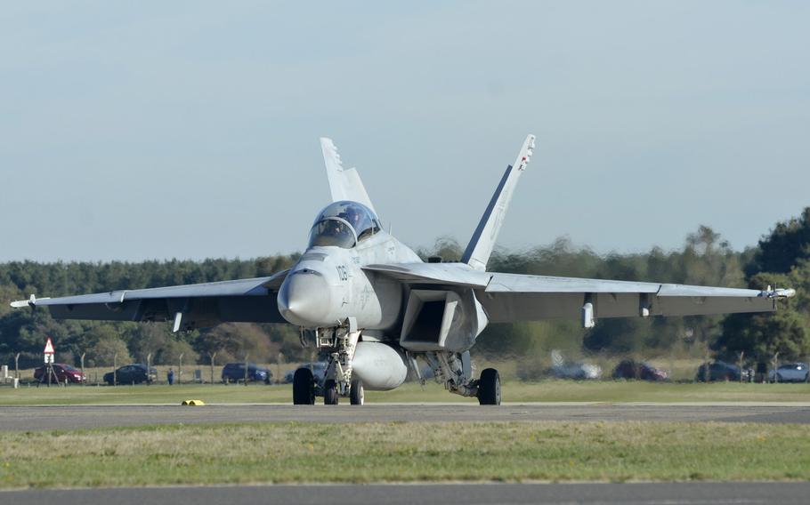 A U.S. Navy F-18 Super Hornet stages for take-off during an exercise hosted by the 48th Fighter Wing at RAF Lakenheath, England, Tuesday, Oct. 9, 2018. 

