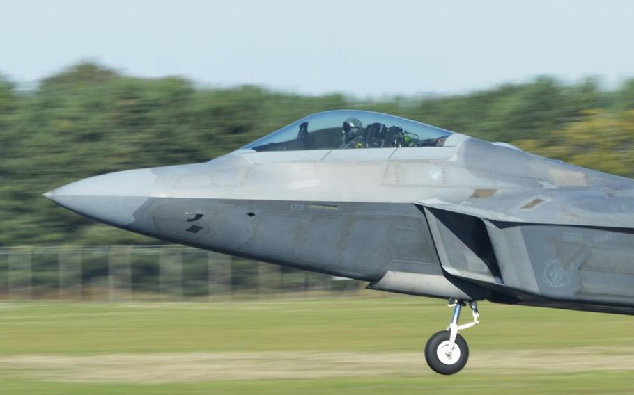 An F-22 Raptor takes off from RAF Lakenheath, England, Tuesday, Oct. 9, 2018, during training hosted by the 48th Fighter Wing. The aerial wargames include two squadrons of local F-15s, eight visiting F-18s and six F-22 Raptors.

