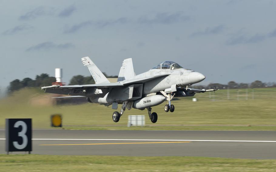 A U.S. Navy F-18 Super Hornet takes off from RAF Lakenheath, England, Thursday, Oct. 11, 2018, during a Dissimilar Air Combat Training exercise hosted by the 48th Fighter Wing. 
