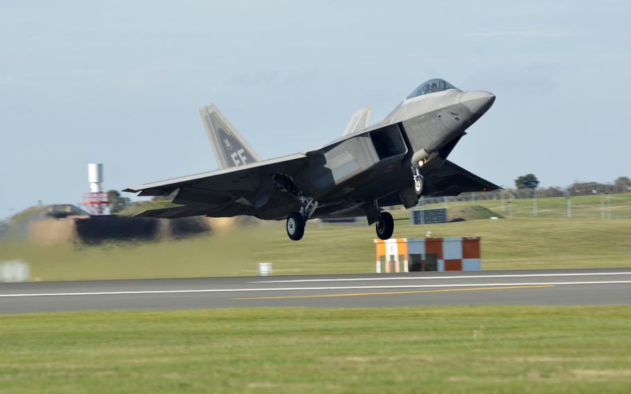 An F-22 Raptor takes off from RAF Lakenheath, England, Thursday, Oct. 11, 2018, during training hosted by the 48th Fighter Wing. 

