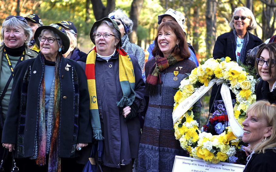 Diane Carlson Evans, left, and Amelia Jane Carson, left, pose for a photo in front of the Vietnam Women's Memorial on Nov. 11, 2018. The two women, both Army nurses in Vietnam, led the charge to establish the memorial. It was dedicated 25 years ago, on Nov. 11, 1993.