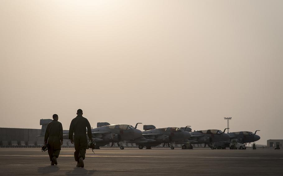 U.S. Marines approach EA-6B Prowlers to conduct maintenance prior to take-off, Oct. 26, 2018, Al Udeid Air Base, Qatar.  Servicemembers have just over a month to decide which retirement plan they'd like to use as they themselves fly off into the sunset. 