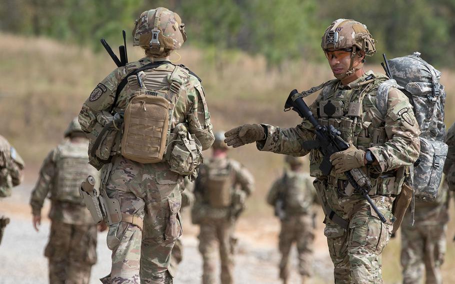Soldiers from the 2nd Battalion, 2nd Security Force Assistance Brigade move to a nearby village as part of a live-fire exercise at Fort Bragg, N.C., on Oct. 24, 2018. 
