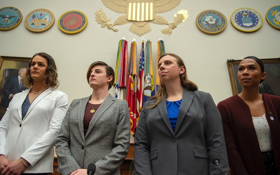 From left, Army Capt. Alivia Stehlik, Army Capt. Jennifer Peace, Army Staff Sgt. Patricia King, and Navy Petty Officer 3rd Class Akira Wyatt prepare to testify about military transgender service policy during a hearing on Capitol Hill in Washington on Wednesday, Feb. 27, 2019.