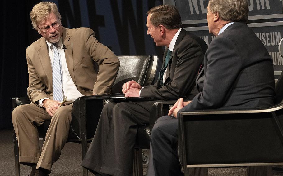 "Military Update" columnist Tom Philpott, left, moderates a panel discussion with retired Gen. David Petraeus and Steve Kroft of "60 Minutes" at the Newseum in Washington, D.C., in October, 2018.