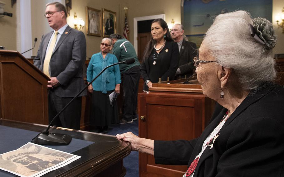 World War II veteran Marcella LeBeau, 99, a member of the Cheyenne River Sioux Tribe, listens as Rep. Denny Heck, D-Wash., speaks at a Capitol Hill press conference on the Remove the Stain Act on June 25, 2019. The bill would rescind the Medals of Honor awarded to soldiers involved in the 1890 Wounded Knee Massacre.