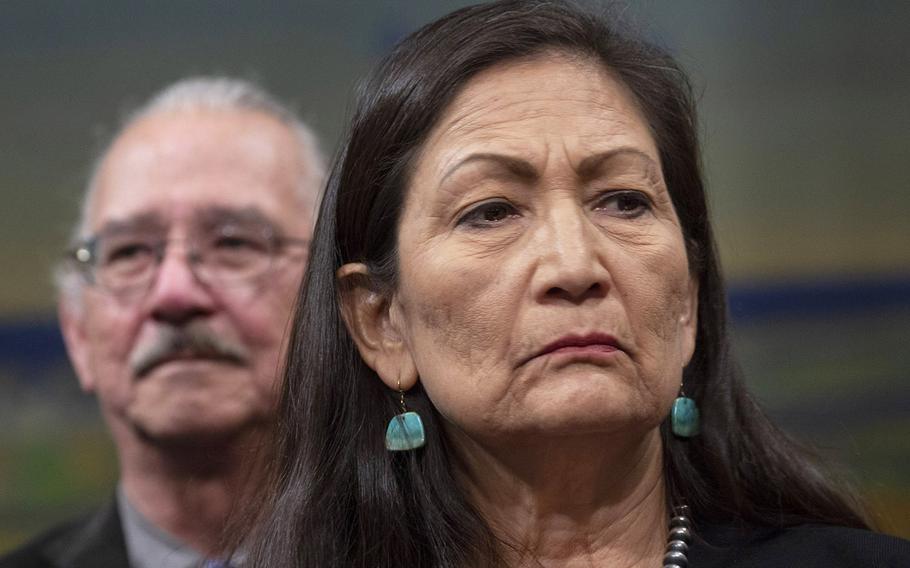 Rep. Deb Haaland, D-N.M., and Navy veteran Oliver “OJ” Semans listen during a Capitol Hill press conference on the Remove the Stain Act on June 25, 2019. The bill would rescind the Medals of Honor awarded to soldiers involved in the 1890 Wounded Knee Massacre.