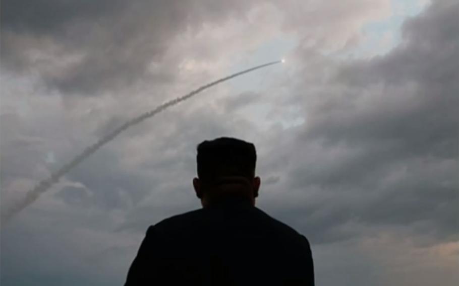North Korean leader Kim Jong Un watches a missile launch in this undated photo released by the Korean Central News Agency.
