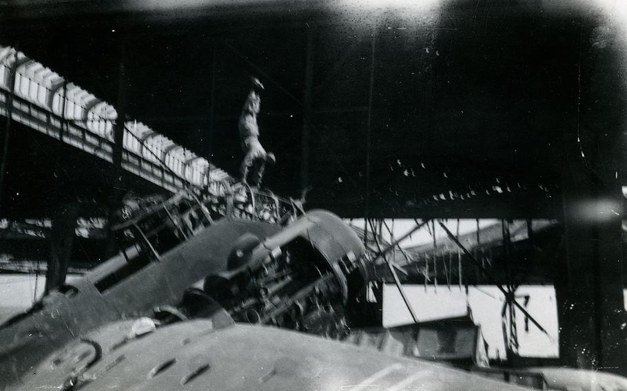 Ben Reise does a handstand on top of a German plane "that never got off the ground," he wrote on the back of the photo. He was an avid gymnast and "the most remarkable handstand person," according to Ruth Reise.