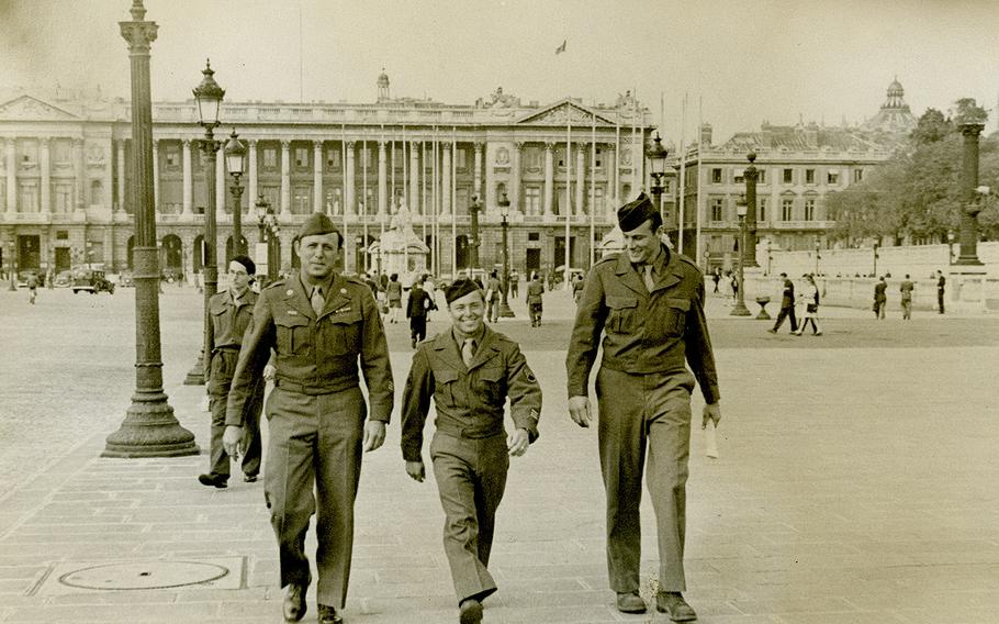 While overseas, Ben Reise, middle, walks down the street with two other servicemen. Reise stood at 5 feet, 4 inches tall and served as a staff sergeant in the Air Force.