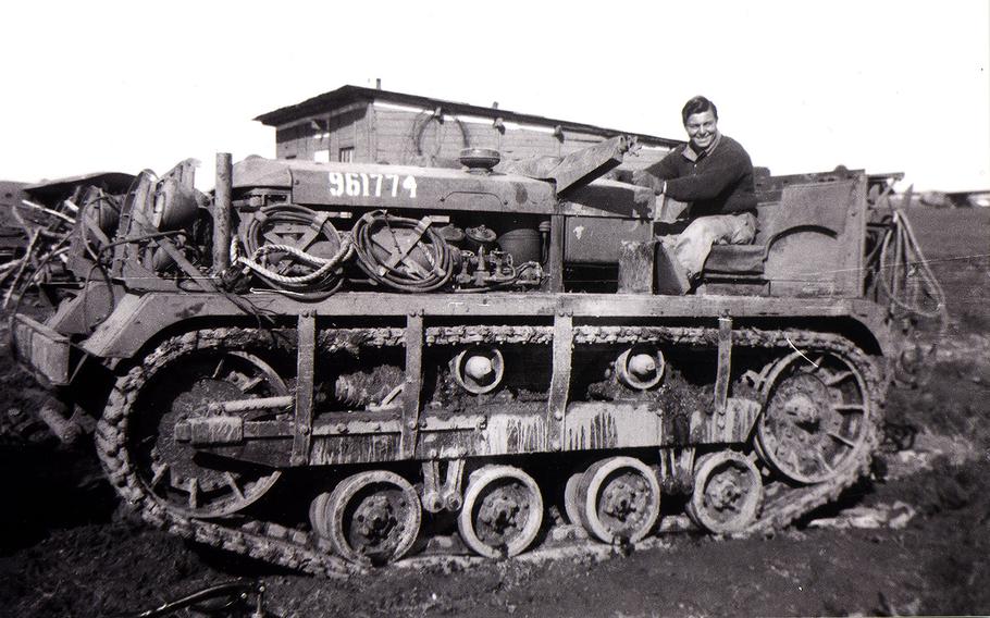 Ben Reise sits on a tank while serving overseas in this photo from 1943.