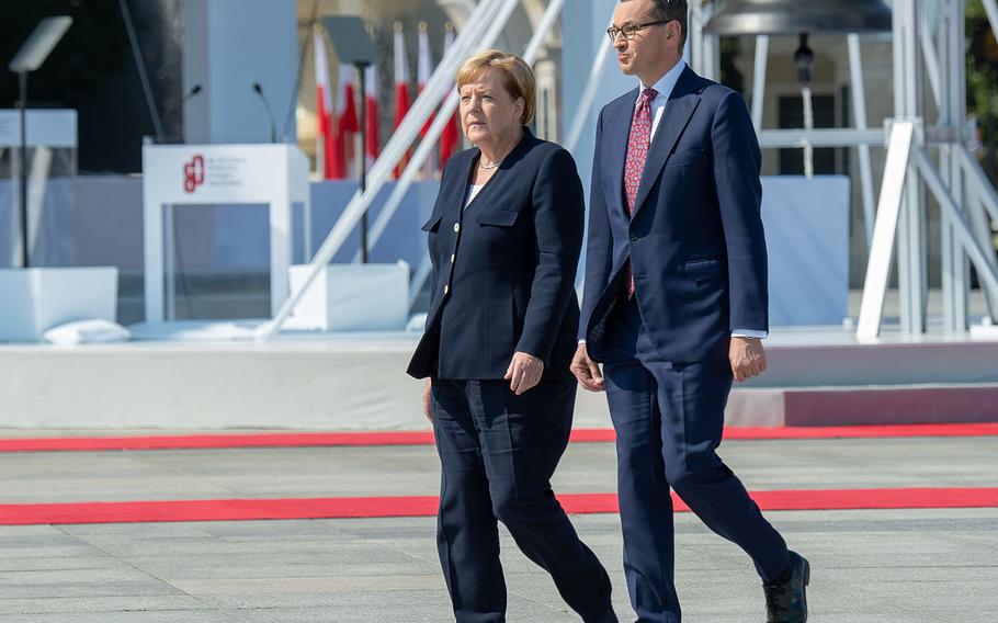 Chancellor of Germany Angela Merkel arrives at a ceremony honoring the 80th anniversary of the start of World War II in Warsaw, Poland, Friday, Sept. 1, 2019.