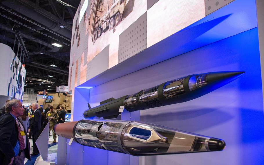 Lockheed Martin's PAC-3 "hit-to-kill" air defense missile, top, and a Thermal High Altitude Air Defense (THAAD) missile are displayed at the annual AUSA convention in Washington, D.C., on Tuesday, Oct. 15, 2019.