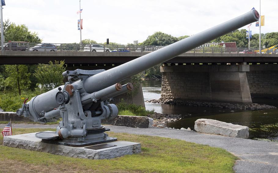 A five-inch rotating gun at the Veterans Memorial Park in Lewiston, Maine, in August, 2019. In the background is one of hte bridges linking the cities of Lewiston and Auburn.