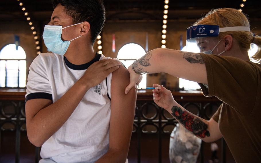 A U.S. Naval Academy midshipman receives the COVID-19 vaccine on March 11, 2021. 