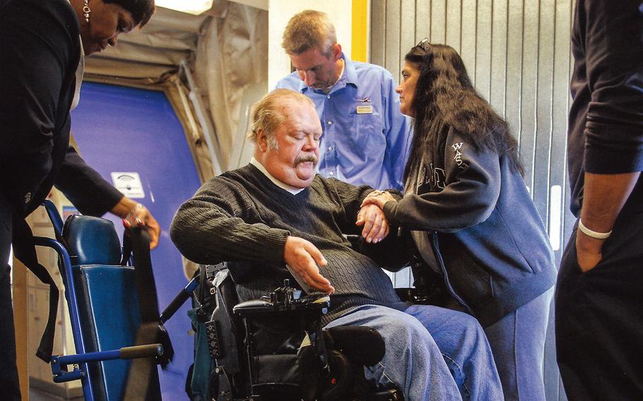 Army veteran Stan Brown, a quadriplegic, relies on a team of seven caregivers, one of whom tested positive for the coronavirus last month. Brown fears being left alone without help if he were to contract the virus.