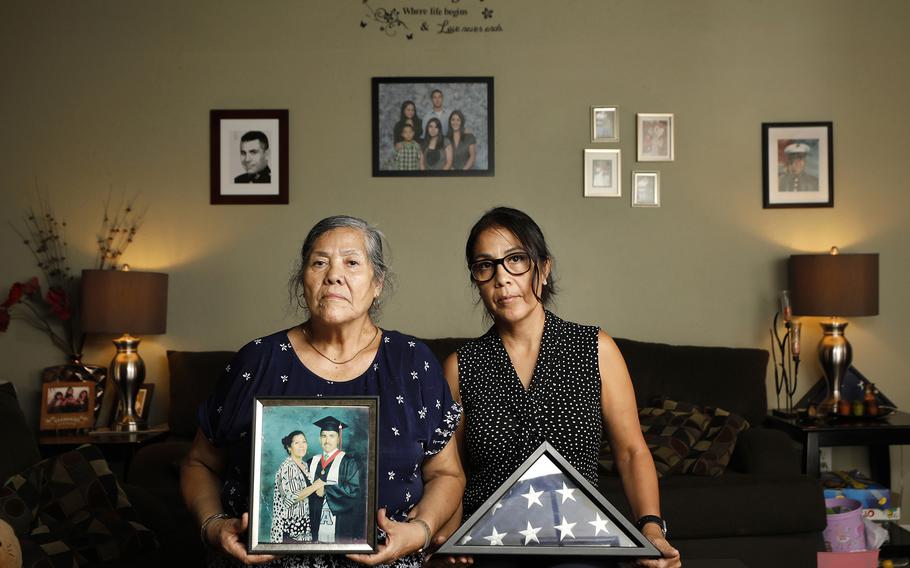 Maria Noriega and her daughter Sonia Jimenez sit in their home on Sunday, August 15, 2021, in San Diego, CA. Maria's son and Sonia's brother 1st Lt. Oscar Jimenez, 34, was killed in 2004 in an ambush while serving near Fallujah, Iraq. 