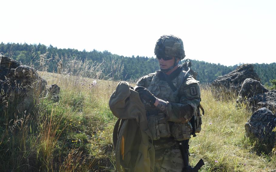 First Lt. Jeremy Lahn, a health services officer with the 30th Medical Brigade, participates in a medical evacuation exercise on July 28, 2020, during the Best Warrior Competition in Hohenfels, Germany.