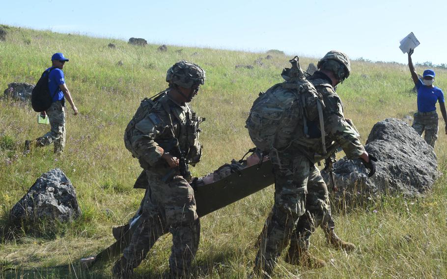 Soldiers from across U.S. Army Europe participate in a medical evacuation exercise on July 28, 2020, during the Best Warrior Competition in Hohenfels, Germany.