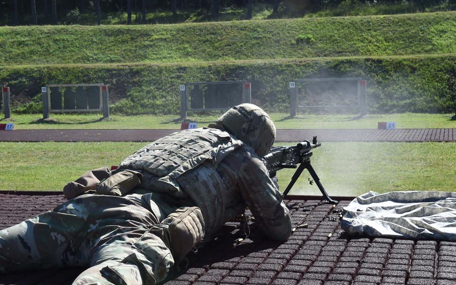 Staff Sgt. William McLain, an explosive ordnance disposal specialist with the 16th Sustainment Brigade, fires at a range on July 28, 2020, during the Best Warrior Competition in Hohenfels, Germany.