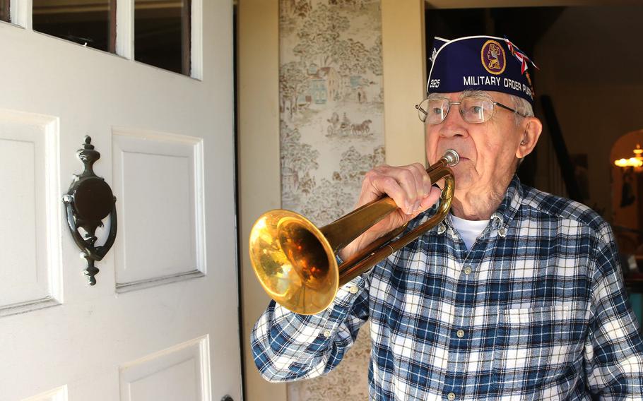 Dover veteran George Sherwood, 94, seen Monday, Nov. 1, 2021, played taps on his bugle when he and his wife, Jane Ann, ran out of candy on Halloween.