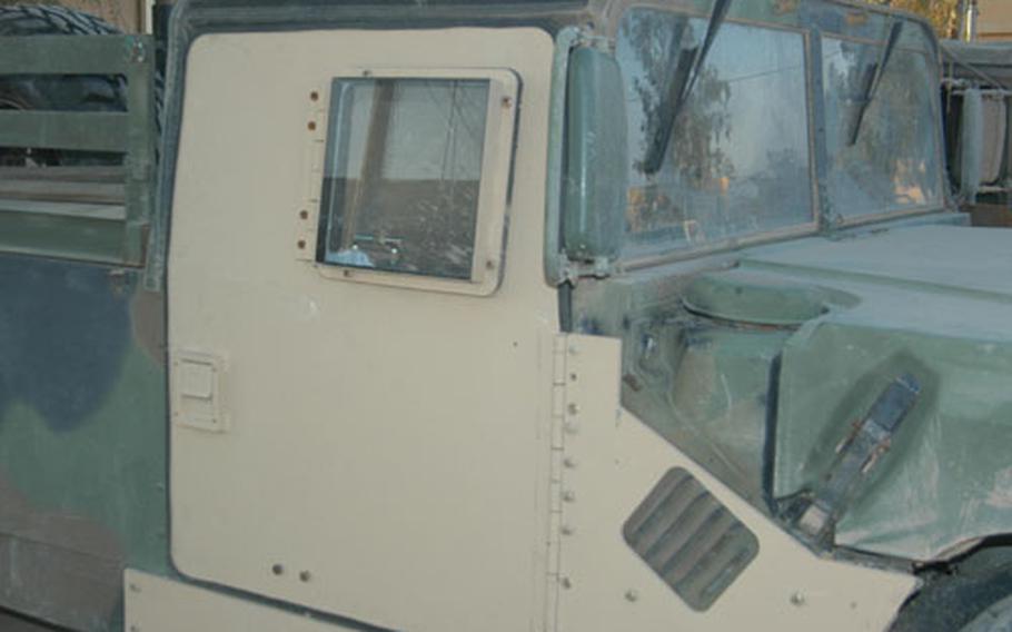 In lieu of a complete armored Humvee, the Army provides armoring kits like this one. The kit, however, does not armor the floor or bulletproof the windshield — crucial for protecting troops from roadside bomb blasts and gunshots.