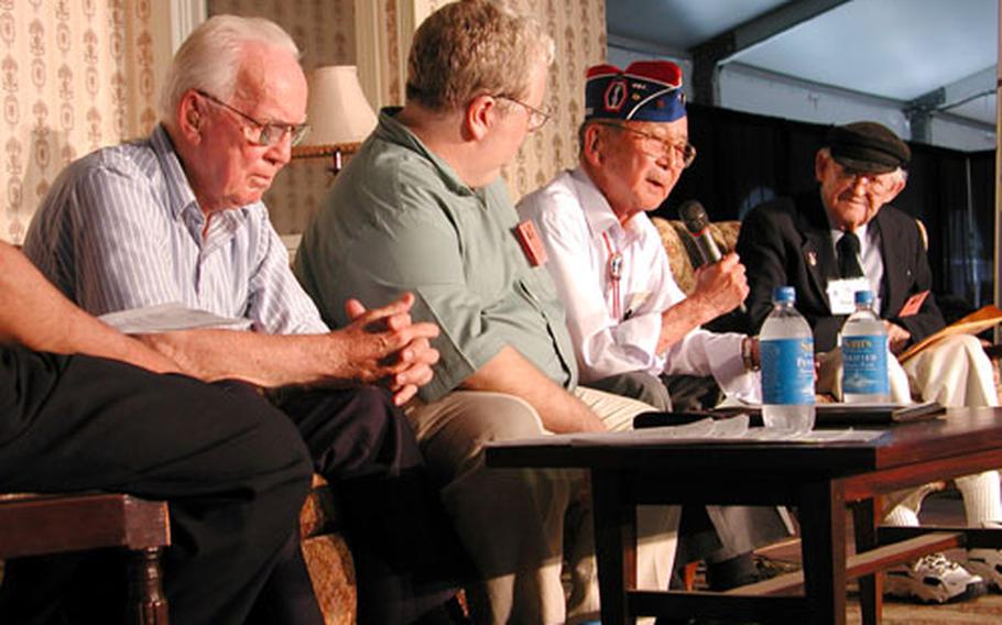Participating in a Veterans History Project discussion entitled "POWs tell their stories" are, left to right, Richard Francies, moderator Tom Swope, Jimmie Kanaya and Marty Higgins.