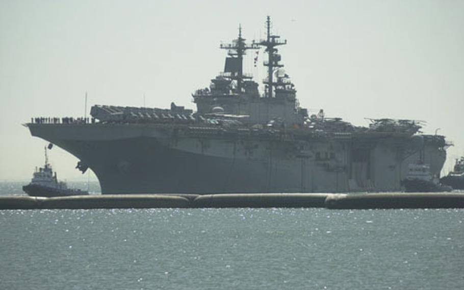 The amphibious assault ship USS Wasp pulls into Naval Station Rota, Spain’s port on Tuesday.