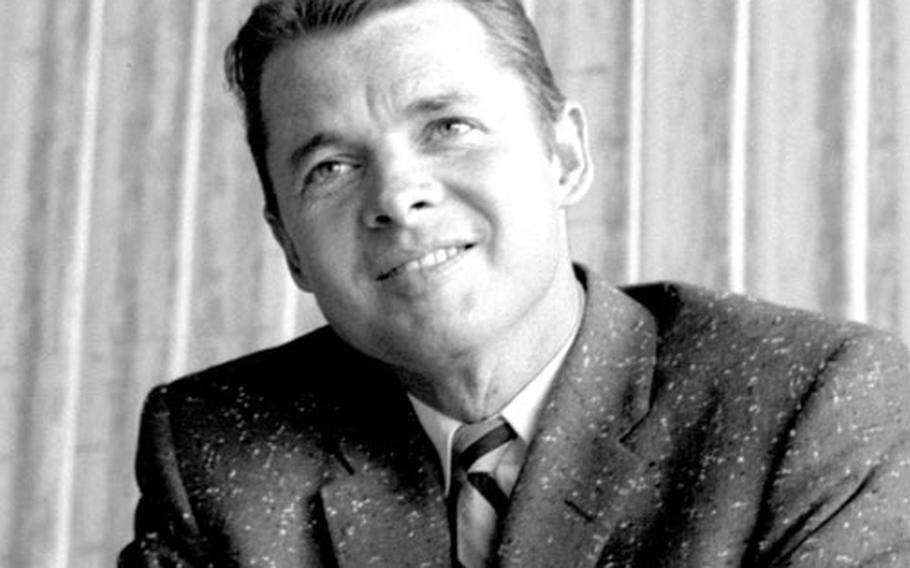 Audie Murphy meets the press at Würzburg, Germany, in June, 1960.